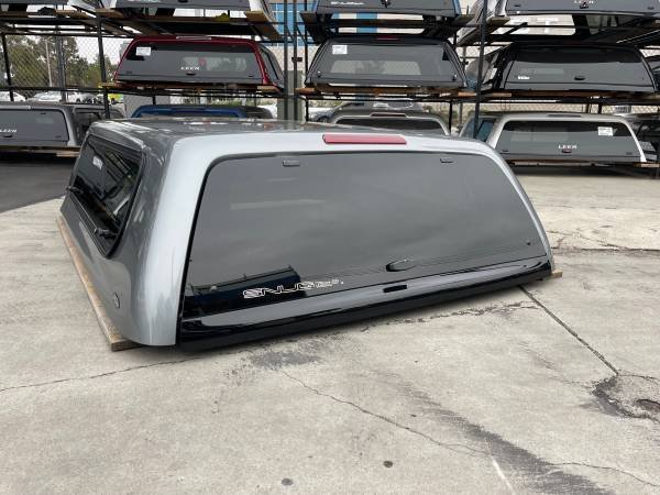 SnugTop Rebel camper shell installed on Silverado Sierra Crew Cab 6.5ft bed
