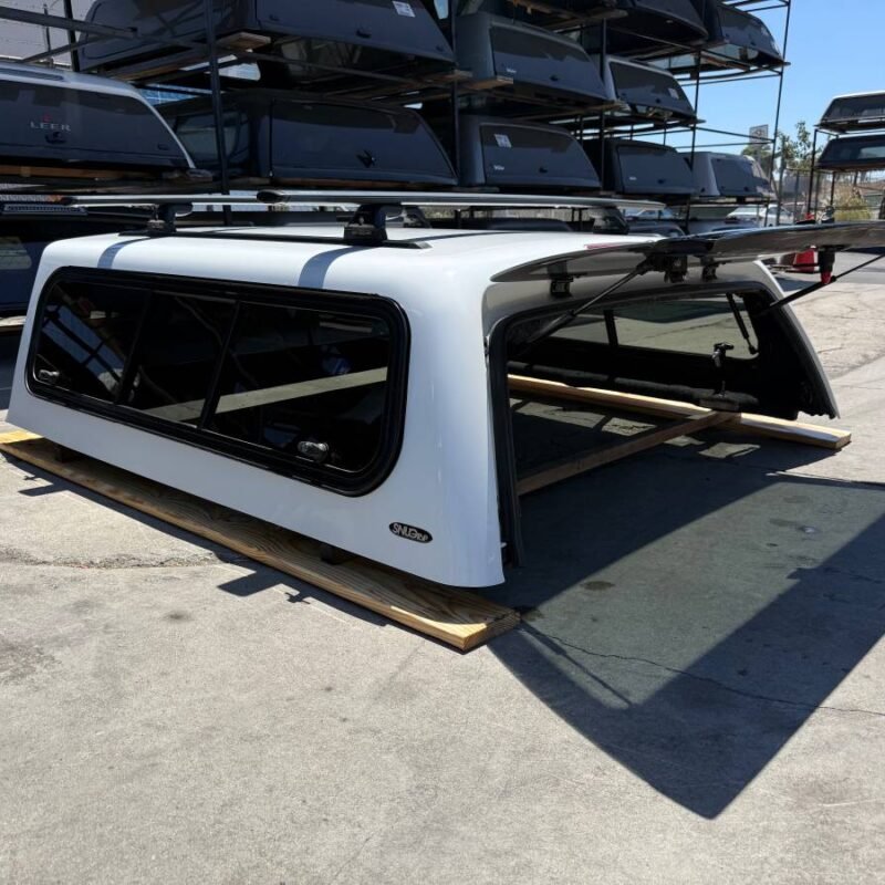 SnugTop Rebel camper shell installed on Toyota Tundra CrewMax 5.8ft bed