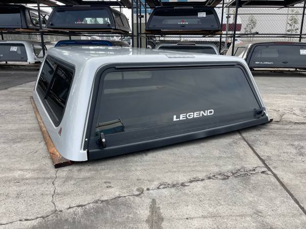 LEER 100R camper shell installed on Silverado Sierra Crew Cab 5.8ft bed