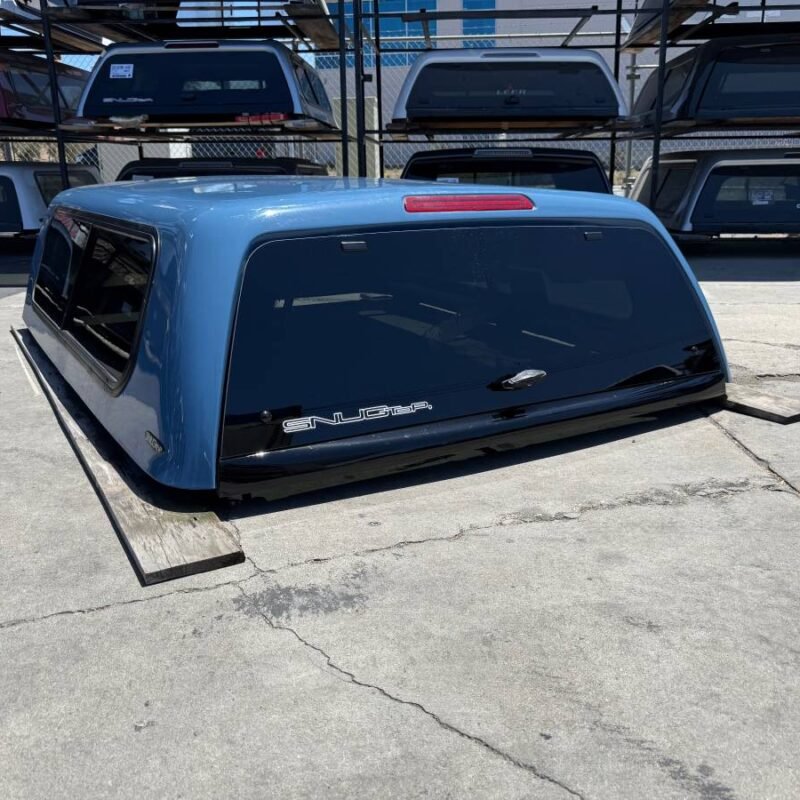 SnugTop Rebel camper shell installed on Toyota Tundra Double Cab 6.5ft bed